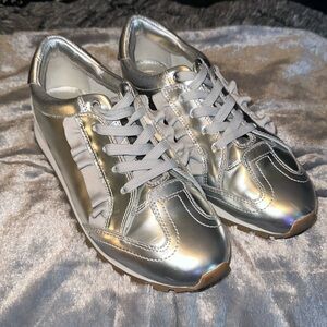Tory Sport Silver/Gray ruffle trainer sneakers in a beautiful matte metallic.
